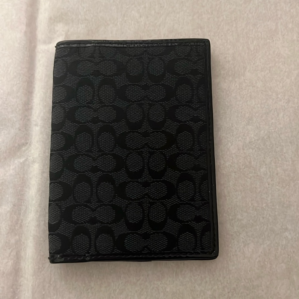 Gently used Black Coach passport wallet
